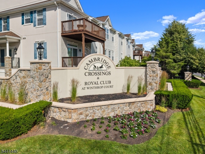 Welcome to this beautifully updated Woodcliff-model townhouse in the desirable gated community of Cambridge Crossings. Offering 2 bedrooms, 2.5 baths, and approximately 2,150 square feet, this home blends comfort and modern style seamlessly. The main level features a bright, open living room, a sleek modern kitchen, and a dedicated dining area that opens to a private deck   perfect for relaxing or entertaining. A laundry room, convenient half bath, and access to the attached garage complete this level.Upstairs, the spacious primary suite impresses with a private bath, walk-in closet, and a versatile bonus area ideal for a home office or sitting room. A second oversized bedroom and an updated hallway bath round out this level. The third level offers a expansive loft space that can easily serve as a third bedroom, home office, or private workout area   a truly flexible bonus that sets this home apart. Residents enjoy access to a clubhouse, fitness center, and swimming pool. With thoughtful finishes throughout and a prime location close to shopping, NY transportation, and major highways, this townhouse offers a truly effortless lifestyle.