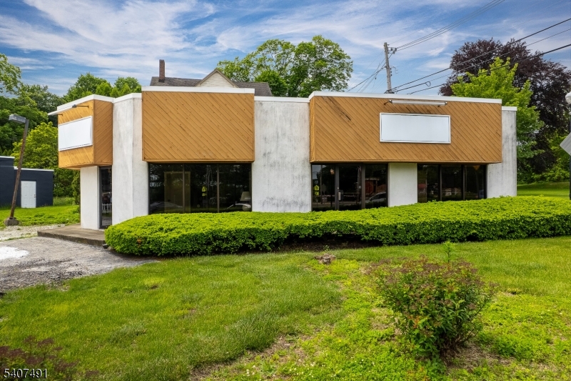 This highly-visible corner lot commercial property presents a compelling opportunity to own real estate in one of Morris County's most accessible and commuter-friendly boroughs. Positioned directly on Main Street, the building benefits from strong visibility, a walkable downtown environment, and proximity to major transportation routes, making it suitable for a wide range of commercial uses. The building, originally constructed in 1942, offers the character and presence of a classic Main Street structure while providing the flexibility needed for today's business and investment demands. Whether intended for retail, professional office, service-oriented business, or an owner-user scenario, the property's location and zoning create a versatile foundation for long-term value. Easily accessable from I80, Route 46 and Netcong Train Station.