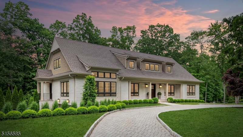 Welcome to this exquisite 6 bed, 4 bath colonial in the sought-after East Hill area. No expense was spared, boasting grand rooms, intricate details, and top-of-the-line amenities. Featuring a two-story foyer, expansive dining room, vaulted ceilings in great room, and cozy family room with gas fireplace. The Chef's kitchen features Wolf range, Sub Zero appliances, wine cellar, and a butler's pantry. The luxurious first-floor suite features a large bathroom and custom closet.  Upstairs are 4 bedrooms, 2 bathrooms, and a laundry room. The outdoor oasis includes a heated pool, spa, outdoor kitchen, and Sonance system. Security, AV system, generator, and 3-car garage complete this stunning home.