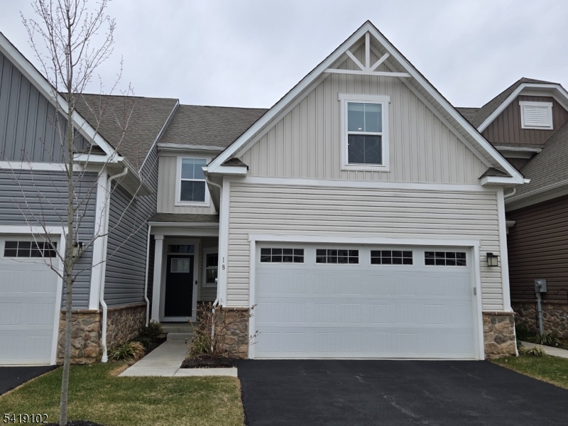 Welcome to the prestigious Village at Hawk Pointe community, a highly sought-after 55+ neighborhood where modern elegance meets effortless living. This beautifully maintained 4-year-old interior townhome offers two floors of thoughtfully designed living space, featuring 3 bedrooms, 3 full bathrooms, and 1 half bath, along with a full finished basement and two-car garage. Designed for both comfort and convenience, this exceptional home includes a desirable first-floor primary bedroom, providing easy main-level living without sacrificing space. Bright and inviting interiors, generous room sizes, and a versatile layout make this home ideal for both everyday living and entertaining. The full finished basement adds valuable additional living space, perfect for a recreation room, home office, fitness area, or guest retreat. Upstairs, additional bedrooms and full bath provide plenty of room for loved ones and visitors. The covered back deck offers up that well deserved area to relax and just enjoy the day. This residence offers the perfect blend of style, function, and low-maintenance living in one of the area's premier active adult neighborhoods where you will be able to take advantage of the tax abatement 'PILOT' program which transfers to the new Owners. This is a rare opportunity to own a newer townhome with exceptional space, desirable features, and an outstanding location.
