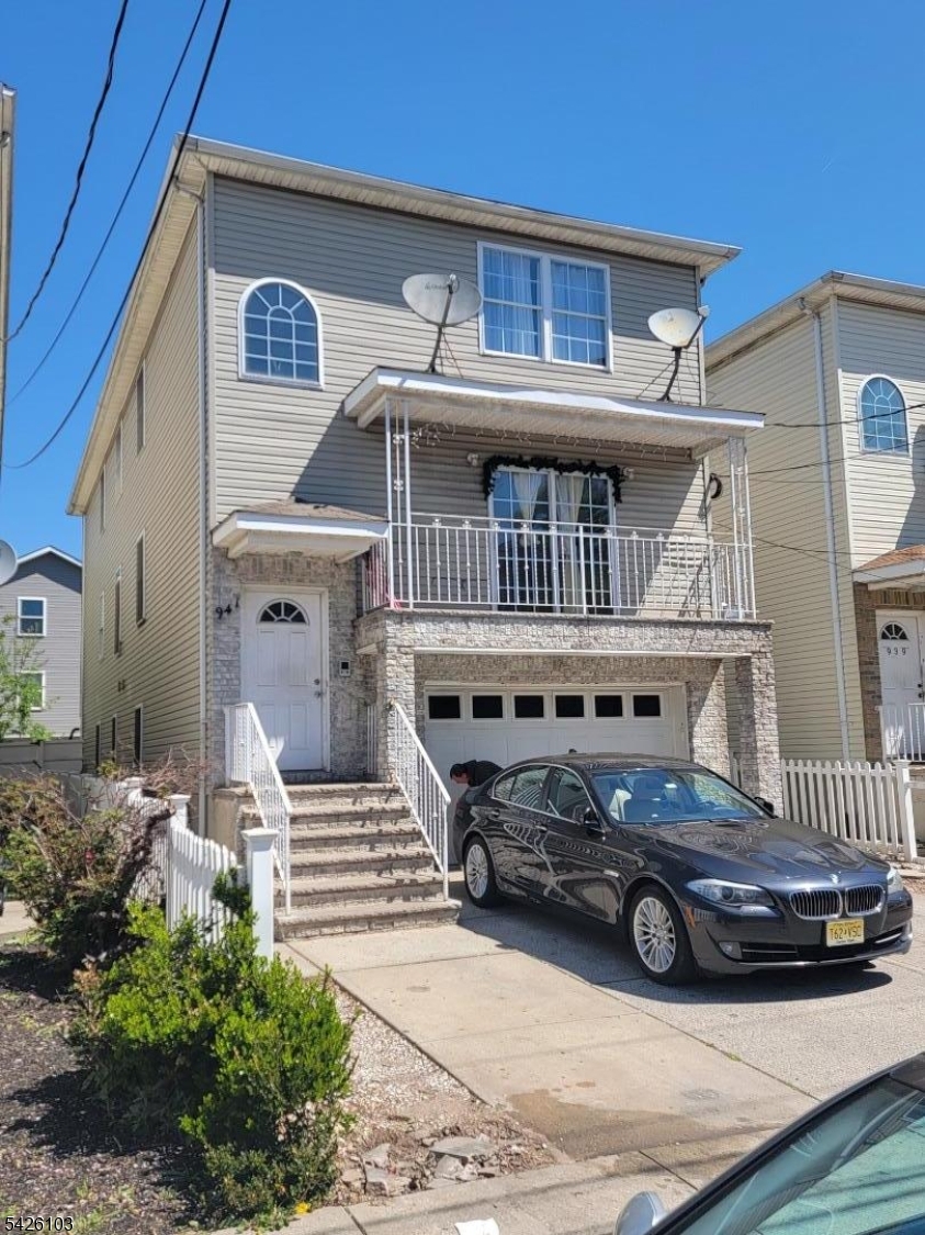 Beautiful two-family home in good condition, featuring three bedrooms two bathrooms laundry area and central AC in each unit. The finished basement includes a recreation room and full bathroom, private backyard and solar panels on a quiet Street. Located close to schools and public transportation; easy to show.