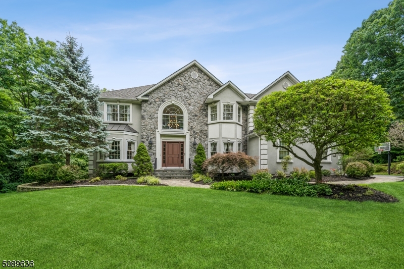 Impressive & beautiful! Elegant two-story foyer welcomes you into this bright & airy colonial on cul de sac! Custom chef kitchen w/ breakfast bar, island, Butlers Pantry, granite cntp, SS appliances is open to family room & breakfast room w/ doors to deck. 1st floor offers living room w/ fireplace, formal dining rm, conservatory, sunrm, mud rm, powder rm.  2nd floor features master suite w/walk-in closet, bath w/jacuzzi, double sink, shower, office; princess suite w/ its own bath; two addl. spacious bedrooms, main bath, laundry rm w/sink. Large windows let lots of light in, most rooms on 1st and 2nd level have hardwood floors. You will love full partially finished walk-out basement with its game room, gym, office, storage room, plumbed for bath already!  Large, private property is perfect for entertaining!!