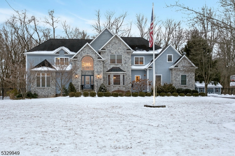 Discover this timeless gem situated on over an acre showcasing outstanding craftsmanship and luxury throughout. This sophisticated 4-bedroom custom colonial is elegant, light-filled and generously scaled with custom moldings throughout. Gorgeous spaces include the graceful two-story foyer and elegant living room. The formal dining room has direct access to the gourmet kitchen which boasts top of the line stainless steel appliances and high-end finishes. The breakfast area leads to the family room which offers a custom coffered ceiling and gas fireplace. Finishing this level is the office with custom built-in cabinetry, two half baths, and laundry room. Upstairs the primary suite impresses with an enormous custom-fitted walk-in closet and bathroom with soaking tub and spa shower. Three additional bedrooms with custom closet organizers, Jack and Jill bath, and another full bath complete this floor. The finished lower level offers endless possibilities with a large rec room, bedroom, and full bath. Enjoy gatherings outside on the patio overlooking the expansive private lawn. An insulated finished shed with electricity, heat, and workshop with cabinetry can be customized to suit your needs! Other features include 3 heating/cooling zones, built in Generac generator, extensive custom moldings, and hardwood floors throughout. Close to downtown Basking Ridge, parks, restaurants, and transportation in a top NJ school district, this is the exceptional home you've been waiting for!