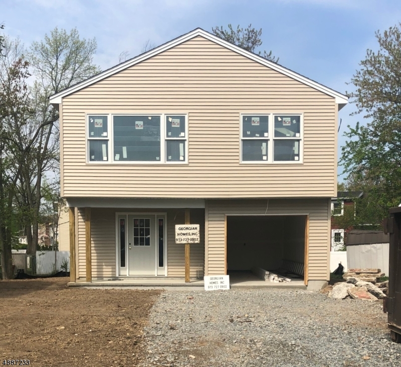 NEW CONSTRUCTION  on a quiet street in desirable Lake Parsippany. This gem will be ready for occupancy the end of June. The main level with vaulted ceilings in the living room, dining room, kitchen, master bedroom. Hardwood floors in liv,din, & hallway. Delightful kitchen with skylight, granite counter tops, and wood floors. Choose your colors for carpet in bedrooms. Central Air, Gas Baseboard heat Quality built home by well known area builder. Time to make the choices which will make this home feel like yours!     NO FLOOD  INSURANCE  FLOOR PLANS ONLINE