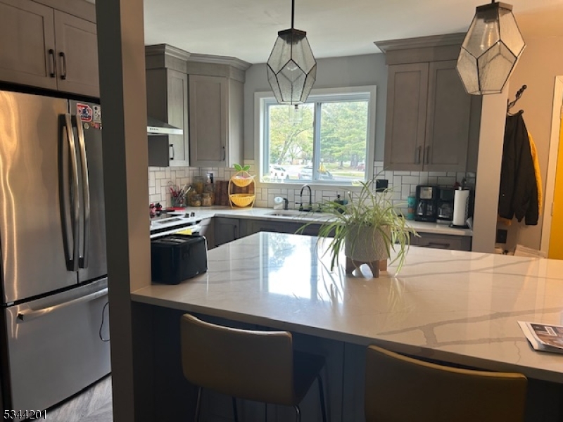 Stunning updated unit, just move right in!  Sunken living room with sliders to private yard - add a patio or deck to your back yard area! Modern main bath with walk in shower - Two bedrooms have walk in closets! Full basement waiting for your finishing touches -great location convenient to local strip mall and YMCA.  Minutes to skiing and water park -easy access to Route 23 and Route 15.