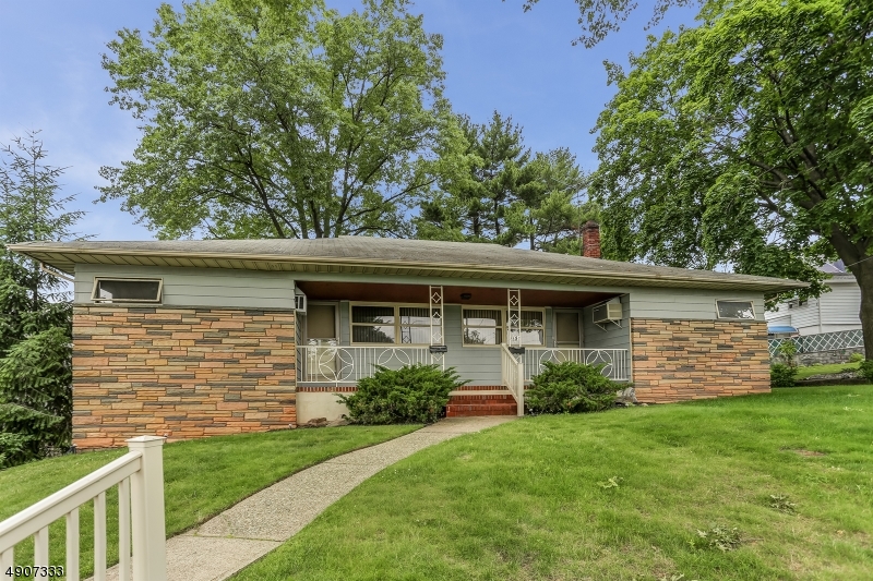 Attention investors.  An opportunity to own a side by side duplex w/full basement.  One side has 1 bed 1 bath Liv & Kitch.  The other has 3 bed 1 bth Living room & Kitchen.  Shared basement & full bth with plenty of room to share.  Currently no driveway check w town for what is required to add one if possible  Large sunroom off back of home..  Home has shared oil tank and and electric meter. there is gas line to house for stove to 3 bed apt. Well built and with some updates can become a great rental income.  underground oil tank removed and new above ground Roth installed 2019