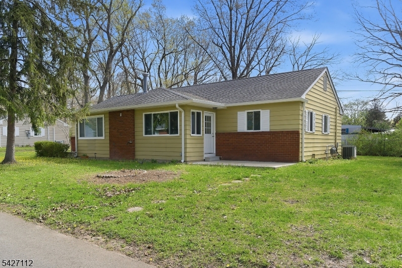 This beautifully updated duplex style 1 bedroom home can be easily converted back to a 2 bedroom and is move-in ready, featuring a new kitchen and bathroom, living room, utility room and laundry. The outside living space offers a private patio, ideal for relaxing. Newly planted privacy bushes and the convenience of a paved driveway for off-street parking. Located in a quiet and social 55+ community with easy access to local restaurants, shopping centers, beaches, and transportation.