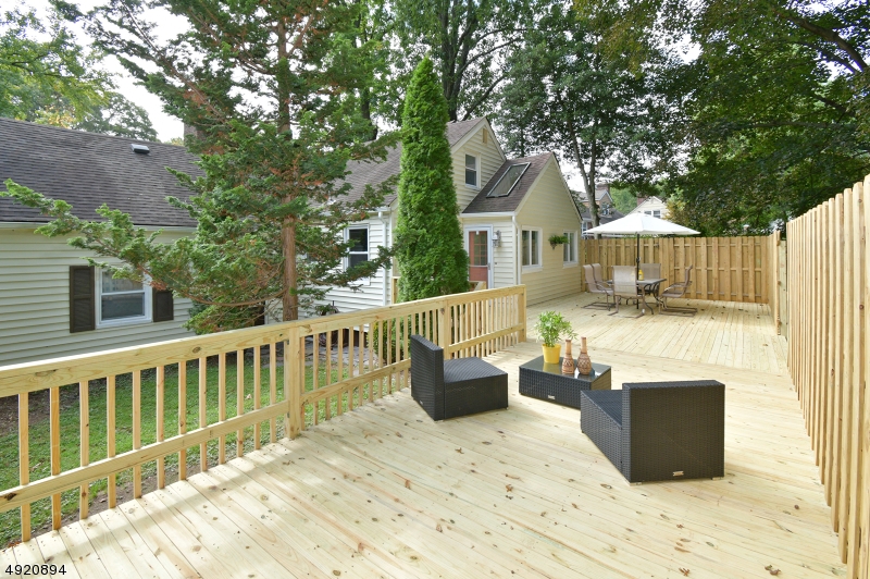 Move-in ready spacious & charming well maintained home in Mountainside. Quiet St one one of the best sections of town, walk to NYC Bus, schools and park. Easy access to major commuter routes. Everything in this house has been touched and refinished or refreshed. Freshly painted, new or renovated hardwood floors throughout first floor and new carpeting on the second floor. The living room has a beautiful working fireplace. Bosch dishwasher.  2 bedrooms on the first floor and master on the second floor with lots of room for reading. Over sized 2 car garage. Climate controlled basement. Expansive Private Deck is perfect for entertaining. New Water Heater & Furnace.Mountainside made the top 10 rounding #9 Best Town by NJ Monthly 2019.  15 Minutes to Newark Airport