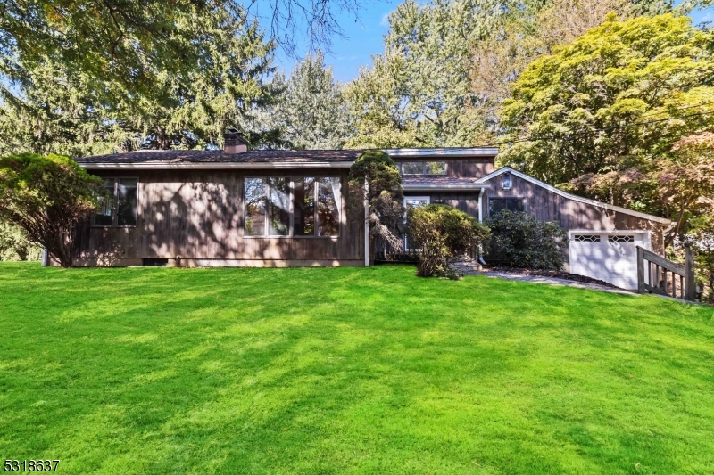 Charming Ranch Home Just Blocks from Chester Downtown.  This is a fantastic opportunity to own a charming 3-bedroom, 2-bathroom ranch in a quiet, desirable neighborhood, just a few blocks from downtown Chester. Offering the ease of one-floor living, this home features beautiful hardwood floors throughout, a cozy living room with a wood-burning fireplace, and a bright eat-in kitchen that opens to both the living and dining rooms. The primary bedroom includes its own en-suite bathroom for added convenience. Natural light streams in through skylights, creating a warm and welcoming atmosphere. A 1-car garage adds practicality, while the large, peaceful backyard offers plenty of space for relaxation, gardening, or outdoor activities. The full, unfinished basement presents a fantastic opportunity to create additional living space whether you dream of a recreation room, home office, or gym, the potential is endless. With your personal touches, and updates this home could easily be transformed into your dream home!  Don't miss this wonderful chance to live in a prime location near Chester's shops, restaurants, and amenities, with great potential for future growth.