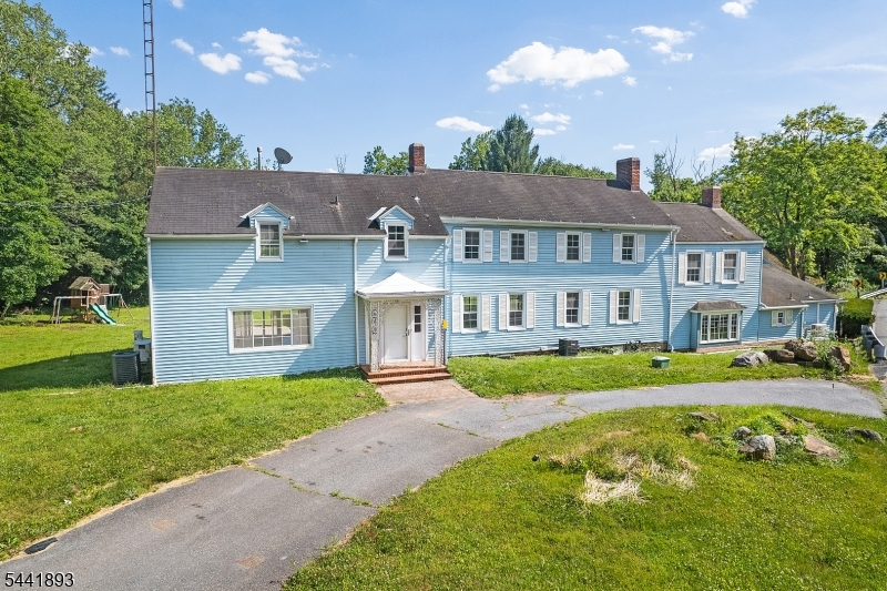 A rare opportunity to own an impressive estate-sized property set on approximately 4.5 scenic acres along the picturesque Musconetcong River. offering more than 4,500 square feet of living space according to tax records, this expansive home provides endless possibilities for a variety of lifestyles, entertaining, working from home, or simply enjoying the privacy and tranquility of its breathtaking natural surroundings. nestled in a truly idyllic setting, the property is surrounded by beautiful mature trees, open green space, and the soothing sights and sounds of the river, creating a peaceful retreat that feels worlds away while remaining conveniently accessible to major commuting routes, shopping, dining, and everyday amenities. Inside, an abundance of living space awaits, with generously sized rooms and a flexible floor plan designed to accommodate a variety of lifestyles. Whether you're seeking room to grow, space for guests, hobbies, or a private home office, you'll appreciate the incredible square footage and versatility this home has to offer. Properties combining this much land, this much living space, and direct frontage on the scenic Musconetcong River are exceptionally hard to find. Enjoy the beauty of every season from your own backyard and experience the perfect blend of privacy, nature, and opportunity. Don't miss your chance to make this one-of-a-kind riverfront retreat your own!