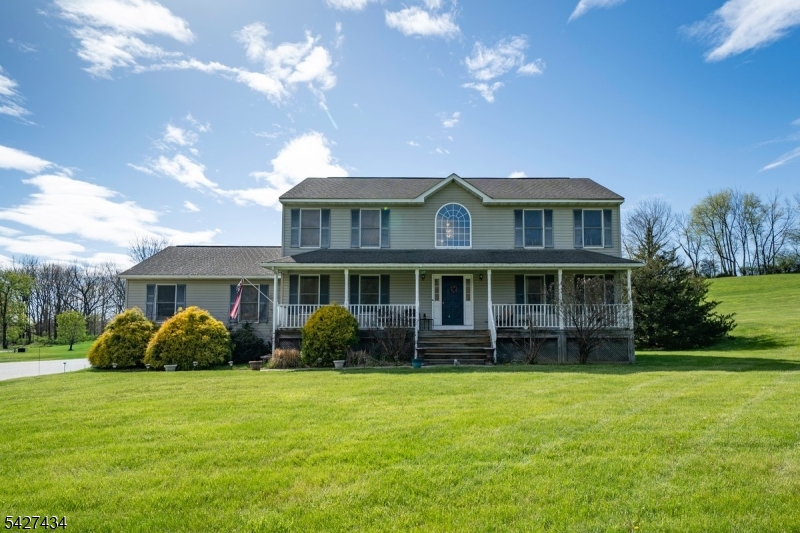**Desirable cul-de-sac location! This well-maintained Colonial offers 3 bedrooms possible 4th and a flexible floor plan designed to fit today's lifestyle. Featuring 2.5 baths and set on 1.15 scenic acres with mountain views, this home blends comfort, function, and versatility.**A charming covered front porch welcomes you inside to bright, spacious living areas ideal for both everyday living and entertaining. The centrally located eat-in kitchen flows effortlessly into multiple gathering spaces including formal and casual living areas, while the sunroom adds additional space for relaxing or gathering. A versatile bonus room provides flexibility for a home office, guest space, playroom, hobby room, or additional living area. Upstairs, the spacious primary suite features a walk-in closet and private bath. Additional highlights include wood floors, beam ceilings, two fireplaces, central air, attached garage, unfinished basement offering future potential, and a deck overlooking the peaceful property and mountain setting. Conveniently located near shopping, dining, recreation, and commuter routes, this home offers the perfect combination of space, flexibility, and location.**Don't miss your opportunity to own in one of Hardyston's sought-after neighborhood settings!**