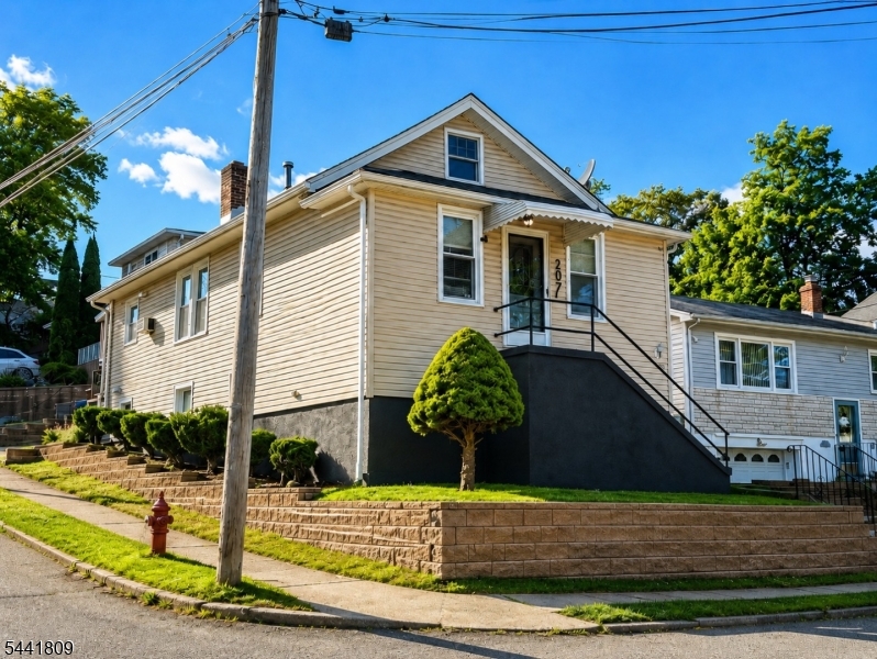 Welcome to 207 Van Winkle Avenue, a well maintained three bedroom home located on a quiet residential street in Nutley, just moments from DeMuro Park. The home features an updated kitchen with white shaker cabinetry and subway tile backsplash with cozy eat in area. The main level offers comfortable living and dining spaces filled with natural light, along with two bedrooms that provide flexibility for a variety of needs. Renovated full baths offer modern walk-in showers. The lower level includes bed room, laundry area, storage, and valuable bonus space with its own private ground level exterior access, creating opportunities for a home office, recreation room, or additional living space.Conveniently located near parks, schools, and major highways, this home offers an excellent opportunity to enjoy homeownership in Nutley, a community known for its convenience, neighborhood feel, and proximity to New York City, at a price point that is becoming increasingly difficult to find.