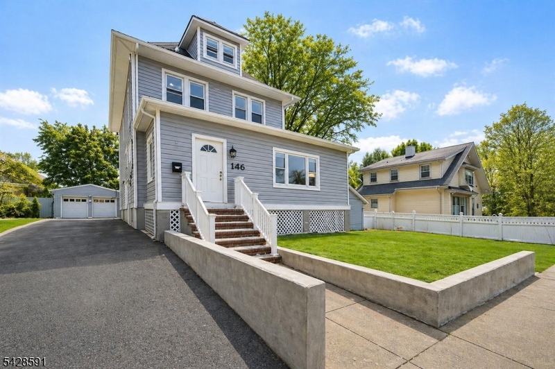 Welcome to this beautifully renovated single family home nestled in a highly sought after neighborhood. This 3 bedroom, 2 full bath residence features a thoughtfully designed open floor plan highlighted by quality millwork and timeless hardwood floors throughout. Bright and inviting living spaces create a seamless flow, ideal for both everyday living and effortless entertaining. The full finished basement offers versatile additional space, perfect for recreation, a home gym, or media room. Upstairs, the walk up attic includes a bonus room that can easily serve as a guest retreat, office, or creative space. A detached garage provides even more flexibility, ideal for a private workspace, studio, or quiet work from home setup. Conveniently located near transportation, parks, and shopping, this home delivers the perfect balance of comfort, style, and accessibility, offering a space you will truly enjoy coming home to.