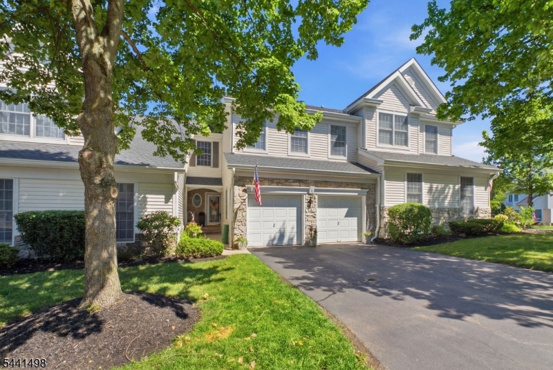 Welcome to 6 Sawgrass Way, a beautifully updated townhome in the highly desirable Westgate at Beaver Brook community of Clinton Township. Thoughtfully improved and impeccably maintained, this home offers a spacious floor plan, stylish finishes, and exceptional flexibility for today's lifestyle. The main level features a bright living room, formal dining area, and updated kitchen with granite countertops and stainless steel appliances. The adjoining breakfast area opens to the Trex outdoor deck. A powder room, laundry room, and direct access to the oversized two-car garage complete the first floor. Upstairs, the expansive primary suite offers a tray ceiling, custom accent wall, luxurious bath with dual vanity, soaking tub, and glass-enclosed shower, plus a spacious sitting room with numerous possibilities. Two additional bedrooms and an updated full bath complete the second level. The finished lower level provides outstanding versatility with a large recreation room, half bath, and ample storage. Recent improvements include a new roof (2026), furnace and central air (2023), and water heater (2022). Additional highlights include natural gas service, underground utilities, and abundant storage. Conveniently located just minutes from downtown Clinton's shops, restaurants, parks, golf courses, and major commuter routes, this exceptional home offers comfort, convenience, and low-maintenance living in one of Hunterdon County's most sought-after communities.