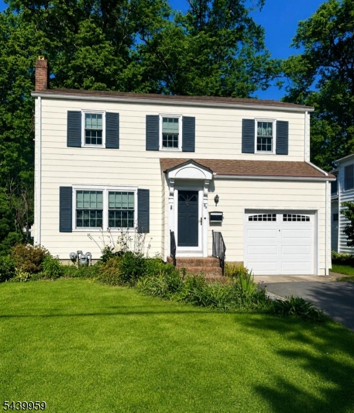 Ideally located just a short walk to parks, vibrant downtown shops and restaurants, and direct NYC train service, this classic 4-bedroom, 1.1-bath Colonial offers a wonderful opportunity to add your personal touch to create the home of your dreams. A welcoming entry vestibule with coat closet opens to a spacious living room that flows into the dining room, featuring a charming built-in china cabinet. A sun-filled three-season room overlooks the level backyard, providing a peaceful space to relax and enjoy the outdoors. The kitchen is adjacent to the dining room and connects to a breakfast room. Also found here are a powder room, storage closet, laundry area, and direct access to the yard. Upstairs are four bedrooms, a full bath, and a convenient linen closet. Hardwood floors add warmth and character throughout much of the home, while the unfinished basement offers abundant storage and future potential. Set on a large property in a desirable neighborhood, this home presents a wonderful opportunity to enjoy as you make it your own.