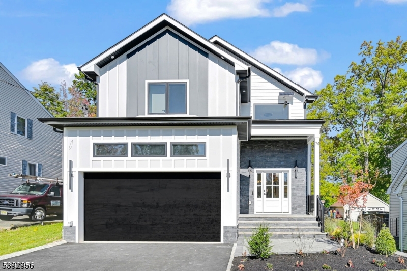 Welcome to this stunning 6-bed, 5-bath custom new construction home across 3 levels on a flat lot with attached 2-car garage. The two-story foyer features wide-plank wood flooring and elegant trim work throughout the open-concept layout. The formal dining room flows into a chef's kitchen with high-end stainless steel appliances, quartz countertops, center island, and walk-in pantry. The living room showcases a sleek fireplace and sliding doors to the backyard for indoor-outdoor living.The main level includes a guest bedroom, full bath, mudroom with built-ins, and garage access. Upstairs, the luxurious primary suite offers a large walk-in closet and spa-like bath with soaking tub, stall shower, and double vanities. A junior ensuite and two additional bedrooms sharing a full bath, plus second-floor laundry complete this level. The finished lower level provides flexibility with a large recreation room, 6th bedroom, and full bath - ideal for guests. Includes a 10-year builder's warranty. Located in the sought-after Livingston School District and close to premier shopping, dining, and houses of worship, this home also offers excellent commuter access with nearby train stations, bus service, and major highways including I-280, I-78, and Route 10.