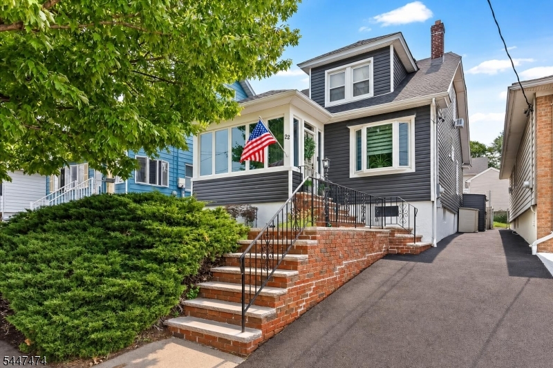 Beautifully Updated 3 Bedroom Home with Lifetime Roof Warranty, EV Charging & Expansive Deck with Hot Tub Lovingly maintained and thoughtfully updated, this 3-bedroom, 1.5-bath home blends modern upgrades with exceptional outdoor living in one of North Arlington's most convenient locations. The first floor has been completely renovated into an open-concept layout, creating bright, inviting spaces ideal for everyday living and entertaining. Major improvements include a brand-new roof and siding, both backed by transferable lifetime warranties, an upgraded electrical service, and a new electrical panel. The partially finished basement offers additional living space with a recreation room and finished laundry area. Step outside to the home's standout feature an expansive custom deck spanning nearly the entire backyard, complete with a hot tub, multiple seating areas, and the perfect setting for relaxing or entertaining. A welcoming front porch provides another inviting space to unwind. Additional highlights include a brand-new driveway with private parking, a dedicated EV charging outlet, public utilities, and all major appliances, including the refrigerator, stove, microwave, washer, and dryer. Conveniently located near New York City, shopping, dining, and major transportation, this move-in-ready home offers the perfect blend of comfort, convenience, modern updates, and outdoor living..