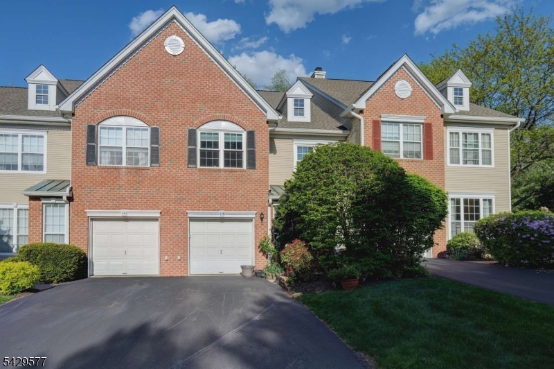 Beautifully updated 3-bedroom, 2.5-bath townhome in the highly desirable section of The Hills in Basking Ridge. Enjoy a peaceful wooded setting, a spacious 23' x 12' Trex deck, and a lifestyle known for convenience, natural beauty, and access to top-rated schools. Inside, the home features refinished hardwood floors, a dramatic two-story living room with a wood-burning fireplace, and an updated kitchen with a breakfast bar, granite countertops, porcelain tile flooring, and stainless steel appliances. The primary suite includes two walk-in closets and a private bath with a soaking tub, separate shower, and dual-sink vanity. Two additional bedrooms, a full bath, and a laundry room complete the upper level. The walk-out lower level offers a recreation room and office/playroom space, adding flexibility for work or leisure. Recent updates include new hardwood floors in 2021, remodeled bathrooms in 2023, and a new central HVAC system in 2021. Residents also enjoy community amenities such as a pool and gym. What stands out most: Morning light you'll actually look forward to the living room gets beautiful sunlight, making it the perfect place to start your day. A real wood-burning fireplace for cozy winter nights Total backyard privacy, enjoy a peaceful setting backing to the woods. Freshly updated bathrooms recently renovated for a clean, modern feel. Walk-out basement with direct access to the woods extra space that brings you even closer to the outdoors.