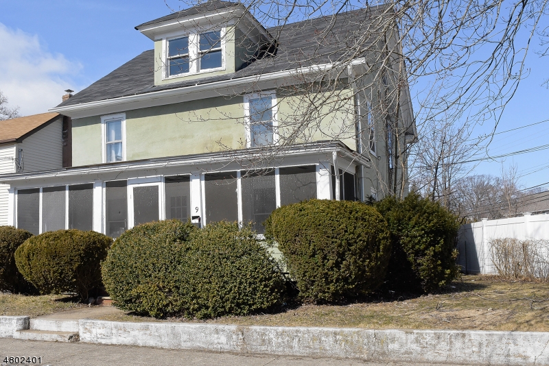 Historic house with a lot of character and charm! This large colonial has 5 nice size bedrooms with closets, beautiful hard wood floors throughout the first and second floors, and a huge enclosed porch perfect for relaxing.  Dining room features original built in curio cabinets.  This home is in an ideal location with nearby parks, hospital, and major highways. Don't miss this great opportunity to own a spectacular and historic home! Laundry located in kitchen.Being sold AS-IS This is a short sale.