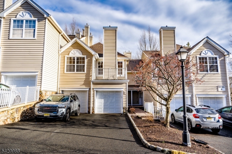 Welcoming and stunning two-bedroom, 2.5 baths townhouse at the Villas in Berkeley Heights. Inviting ground level with great size foyer, lots of closet space and access to the garage and partial basement with storage. The main level features a spacious living room with tons of natural light plus a gas fireplace perfect for winter days, modern kitchen with granite counter tops and plenty of cabinet space. Convenient powder room, laundry room and dining area with access to the balcony also on main level for convenience. Second floor with two great size bedrooms and two full baths. Master bedroom with walk- in closet, ensuite bathroom with soaking tub and double sinks. Newer washer and dryer. Central AC and heating, two zones. Garage for one car and private driveway plus visitor parking available in complex. Close proximity to downtown with access to train station and public transportation. Available now. No smokers or pets allowed. Tenant pays for all utilities. Background, credit check a must as well as employment verification.