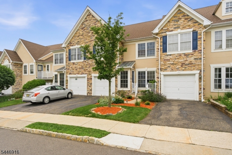 Welcome home to resort-style living at its finest in the highly sought-after Lakeside at North Haledon! Perfectly situated in a prime cul de sac location, this lovingly maintained Belmont model, proudly owned by its original owners, offers 3 BR's, 2.5 BTH's, and a desirable walk-out lower level. Step inside to beautiful wood flooring throughout all three levels, recessed lighting throughout, and updated mechanical systems, including a newer hot water heater & water softener. The main floor features a formal LR and DR, a convenient powder room, and two-story family room filled with natural light that flows into the spacious eat-in kitchen. Sliding glass doors lead to an oversized deck perfect for entertaining or relaxing outdoors. Upstairs, the spacious primary suite boasts cathedral ceilings, dual walk-in closets, and ensuite bath with a Jacuzzi soaking tub, separate stall shower, and double vanity. Two add'l bedrooms, a full bath, and a conveniently located 2nd floor laundry room complete this level. The finished walk-out lower level offers a versatile great room with sliding doors to a private patio, plus abundant storage space. Enjoy exceptional resort-style amenities, including a clubhouse with a fitness center and billiards room, a pool and hot tub overlooking the sparkling lake, boating and fishing, tennis courts, and beautifully maintained grounds. With an easy commute to NYC, this exceptional home truly has it all. Don't miss this incredible opportunity!