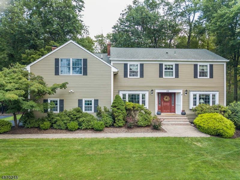 Exceptional Shongum Lake Colonial featuring 5BR, 3.1 BTHS. Large expanded kitchen w/ custom Cherry wood cabinets, granite, Viking / Miele appli. & Slider to Trex Deck. FR w/ built-ins, WB Firepl. Lg Master en suite w/ cathedral ceilings, skylights, walk-in closet & sitting room. A Princess Suite w/ full bath. 3 other spacious bedrooms, main bath & upstairs laundry. Enjoy Lake Views & walk to the beach from this prime location. The Shongum Lake community features a clubhouse, beach, boating, swimming, & a full calendar of social activities. Public Utilities. 2 Zone Heat & AC.