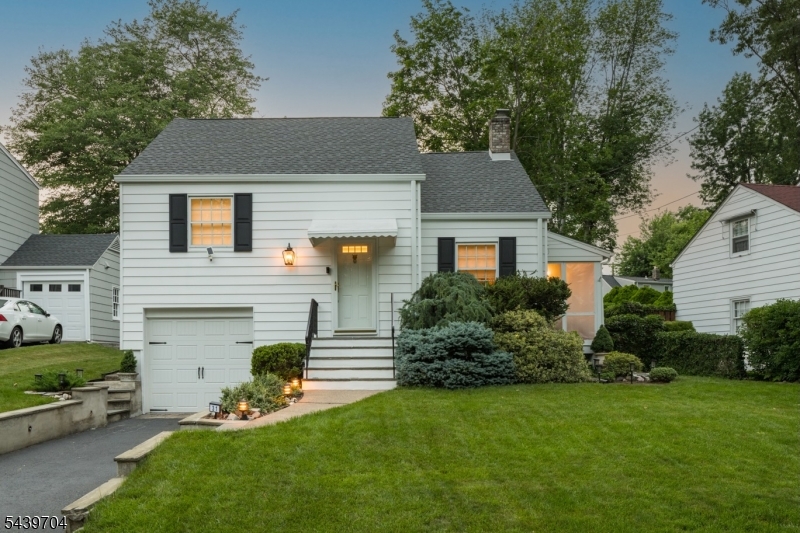 3-BED GEM BOASTING FLEXIBLE FLOORPLAN & GORGEOUS YARD ON TRANQUIL STREET ACROSS FROM SUMMIT'S BRIANT PARK. Amazing, best-of-all-worlds location offers tranquil parkland & fitness trails minutes from downtown Summit's shops, restaurants & direct NYC train. Beautifully maintained with gleaming hardwood floors throughout. Bright Kitchen features white wood cabinetry & charming arched doorway leading to cheerful & light-filled Breakfast Area. Great indoor/outdoor living with easy access to expansive bi-level wood Deck w/ lovely latticework detailing. Ideal for sipping morning coffee, relaxing or entertaining a crowd. Level, lush & fully fenced Back Yard is idyllic & private, enveloped by layers of tall, leafy trees & carefully manicured planting beds. Entry vestibule offers Coat Closet & glass French door. Spacious Dining or Living Room welcomes w/ multiple Windows & access to lovely, peaceful screened-in porch tucked at side of home. Up a half flight of stairs, find 2 light-filled Bedrooms w/ Windows on multiple exposures that share Full Hall Bath offering tub/shower & classic black & white tile. Large-but-cozy Family Room boasts vaulted, wood-lined ceilings & full-size Windows. Bedroom 3 is private & peaceful, boasting a Window seat w/ Storage, vaulted ceiling w/ custom moldings. Lower Level offers Storage Area, Laundry w/ utility sink, tall ceilings & potential to use as Home Office or Rec Room. Top-ranked Summit Schools. Extra-deep 1-Car Garage. Don't miss 31 Briant Parkway!