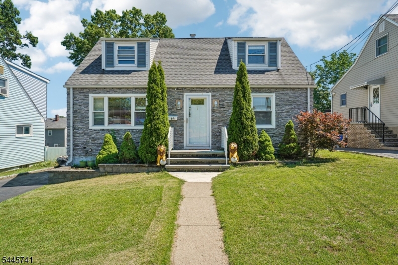 Welcome to this beautifully maintained 3-bedroom, 2-bath Cape Cod offering the perfect blend of comfort, style, and functionality. The main level features two spacious bedrooms, a full bathroom, a bright living room, and an updated kitchen with an adjoining dining area that opens to a large deck perfect for entertaining or enjoying your morning coffee. Upstairs, you'll find a private primary bedroom complete with a cozy sitting area, creating the perfect owner's retreat. The full finished basement provides additional living space, ideal for a family room, recreation area, home office, or gym, along with a second full bathroom for added convenience. Step outside to an inviting, fully fenced backyard featuring a spacious deck and plenty of room for outdoor gatherings, gardening, or play. A private driveway and attractive curb appeal complete this move-in-ready home. Don't miss the opportunity to make this charming Cape Cod yours!
