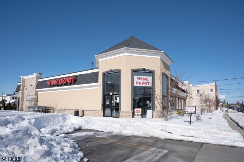 Located on Chestnut Street in Union, NJ, this prime commercial property offers a rare, fully built-out retail opportunity with exceptional infrastructure in place. Formerly operating as a liquor store, the main level features over 6,000 square feet of open retail space with a glass entry foyer and two sets of doors, creating strong curb appeal and smooth customer flow. The layout includes extended counter space, multiple refrigerated display units, a walk-in freezer, two bathrooms, and utility sinks, making it well-suited for retail, specialty food, beverage, or service-oriented businesses. Operational efficiency is a standout feature, with a rear loading dock, private parking lot, and shopping cart corral supporting both customer convenience and back-of-house logistics. The building is further enhanced by a roller conveyor system connecting the basement to the main floor, ideal for high-volume inventory movement. The 6,188-square-foot basement level provides substantial additional value, offering extensive storage space along with a utility room, private office, and utility sink, allowing for clear separation between retail, administrative, and operational functions. With its scale, visibility, and built-in infrastructure, this property presents an outstanding opportunity for business owners or investors seeking a high-performing retail location in a strong Union corridor. This is a versatile, turnkey space designed to support growth, efficiency, and long-term value.
