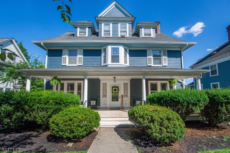 Set right in the heart of town, this gorgeous center hall colonial offers an incredible blend of modern updates and savvy financial opportunity. Imagine waking up to the NYC skyline, all while being in the heart of downtown Montclair. Relax and unwind on a rocking chair front porch or back deck. The interior and exterior of this home was newly painted, perfectly complementing stunning hardwood floors, original millwork, 4 original fireplaces, and pocket doors found throughout the home. A recently renovated eat in kitchen is the heart of the home, and exudes timeless charm and modern amenities. With 7 bedrooms and 5 updated bathrooms, you can find time to relax and unwind for years to come. A walk-out basement provides a versatile retreat complete with its own bathroom, convenient small kitchen, new gas boiler, and ample storage. One of the most compelling aspects of this property is its impressive income potential. The third-floor apartment and spacious parking lot currently generate over $3,000 in monthly rental income, offering a fantastic way to offset costs while you enjoy everything the home has to offer. The location is truly hard to beat. You are moments away from the vibrant energy of local shopping and restaurants, the renowned Montclair Art Museum, and beautiful local parks. With NYC transit nearby, getting around is a breeze. Move right in and enjoy a lifestyle of convenience and smart homeownership. Windows, chimneys, fireplaces conveyed as is.