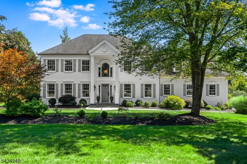 This exciting home has it all! The sought-after Prince Edward Pointe neighborhood is the setting for this stunning colonial residence, which has been updated to perfection. Sophistication, style, and exceptional quality define every space. A graceful bluestone walkway and columned entry invite you inside, where sun-filled rooms are enhanced by extensive custom woodwork, gleaming hardwood and stone floors, designer lighting, and custom window treatments. Entertain with ease in the chef's kitchen featuring plentiful custom cabinetry, granite countertops, and top-of-the-line appliances. Multiple gathering spaces, including the striking 2-story family room with fireplace and light-filled sunroom, flow naturally to the expansive paver patio complete with a grilling station and firepit, creating exceptional indoor-outdoor flow, perfect for large gatherings or quiet evenings. The impressive primary suite awaits, with a large closet and a sumptuous bathroom featuring a soaking tub and a glass-enclosed shower. The updated lower level allows flexible recreation and media spaces as well as abundant storage. The exterior has been transformed with Hardie plank siding, upgraded trim, and copper-like gutters, while landscape lighting highlights the open lawns and specimen trees. Automatic generator. This coveted location is close to our award-winning schools, shopping, dining & recreation, as well as nearby nationally ranked golf courses. Convenient access to highways and NYC train and bus.