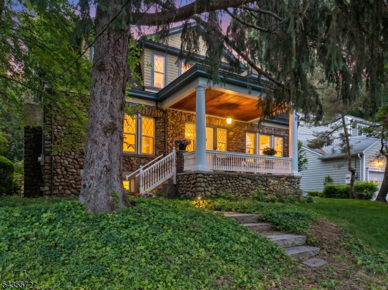 Step back in time, and explore this charming 2,847 SF Dutch Colonial, originally built in 1903 and beautifully set on .43 acres in sought after Glen Rock.  A welcoming front porch with fieldstone facade introduces this character-filled home featuring 5 bedrooms, 1 full and 3 half baths.  The spacious downstairs layout offers generous living room and formal dining room with 2 fireplaces (as-is).The kitchen opens to a newer deck overlooking a large backyard with inground pool, cabana and detached 2.5 car garage, ideal for entertaining. Upstairs, the third floor includes 2 storage rooms with exciting expansion potential.  Paratially finished basement w/FPL (as-is), with laundry room, workshop, and additional bedroom.  Enjoy top-rated Blue Ribbon schools, a vibrant downtown and convenient train and bus access to NYC.
