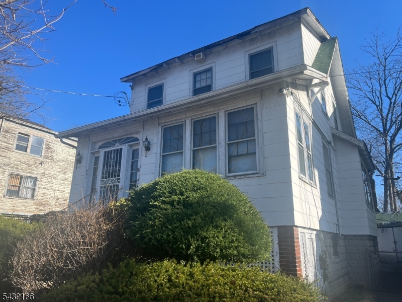 Estate sale. Three bedrooms; living room; dining room; eat in kitchen; half bath off the kitchen; enclosed front porch; basement unfinished; pull down for access to the attic; driveway; detached garage; back yard.