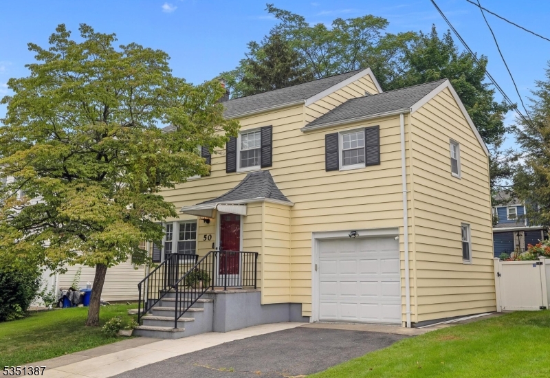 There's so much to love about this beautiful home! The main level spaces are defined but flow openly with rich hardwood floors and natural light from many windows. The nicely updated kitchen has granite counters, stainless appliances, subway tile backsplash, classic tiled floor, and access to the lovely, fenced backyard with a stone paver patio. From the kitchen, entry to the garage also leads you to a finished basement with full bath, laundry, and built-in shelving. The upstairs has a large primary bedroom and two nice sized bedrooms that share a full bath. For an added bonus, you have central AC and water filtration. Bloomfield offers suburban charm with urban convenience such as Broad St eateries, local favorites like Holstein's, close access to commuter routes, and NJ Transit service to NYC.