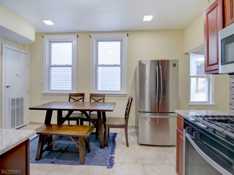 Welcome to this legal two-family home, thoughtfully configured and offering exceptional space and flexibility. Previously utilized as a three-family, the property now features an expanded second unit spanning the second and third floors, creating a rare six-bedroom layout.The first-floor unit offers 3 bedrooms and 1 full bath, while the second floor unit includes 3 bedrooms and 1 full bath on the second floor, seamlessly connected to an additional third-floor level with 3 bedrooms, providing generous living space ideal for work-from-home needs or added flexibility.The home was gut renovated in 2019 and includes hot forced air, two separate gas meters, and two separate water heaters. A washer and dryer are conveniently located in the basement.Perfectly situated just one block from the Brick Churc Train Station with direct access to NYC, and offering easy access to Route 280, the Garden State Parkway, and nearby shopping, this property is a commuter's dream and a strong investment opportunity.A rare blend of space, location, and income potential this is one you don't want to miss.