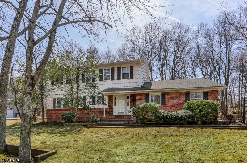 This Whippany home w/ 4 bedrooms, 2 1/2 baths in the sought-after Bee Meadow neighborhood has a great floor plan with lots of room. House has been freshly painted. New Powder Room bath. Enjoy the easy flow from the kitchen complete with a center island to the family room.  Formal Living Room & Dining Room with new Hardwood floors. Master Bedroom w/full bath. Hallway Bath has been updated. All four bedrooms have generous closet space.   Township has a beautiful town pool, community center, before/after school programs. Low property taxes & excellent schools. Easy access into downtown Morristown & NYC Midtown Direct Train.