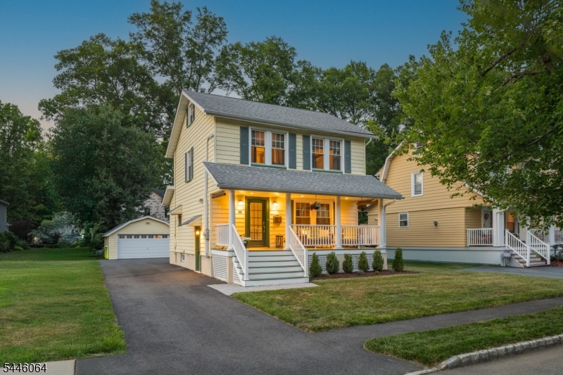 LOVELY & INCREDIBLY WELL-MAINTAINED 3-BED COLONIAL IN VIBRANT LIVINGSTON NEIGHBORHOOD. Great bones & long list of modern updates. Bright & sun-filled w/ newer Windows & gleaming refinished (2026) hardwood flooring. Charming curb appeal from welcoming composite wood Covered Front Porch that's the perfect spot to sip morning coffee. Rooms flow graciously into each other, starting w/ a cheerful, bright Living Room. Dining Room sized for entertaining has wood/glass doors opening to Deck & level Back Yard w/ privacy fencing. Sits adjacent to 2 undevelopable city-owned lots where neighbors gather. Large Eat-In Kitchen updated (2021) for today's living boasts s/s appliances, leathered granite countertops, easy-to-maintain wood-look Pergo flooring. Primary Bdrm w/ large Closet & 2 more Bdrms share Full Hall Bath w/ radiant heat flooring, wood vanity & tub/shower w/ tile surround. Walk-up Attic has tall ceilings, great Storage & lots of potential. Partially finished Lower Level offers lovely Full Bath, recessed lighting & freshly painted cement flooring (2026). Use as Rec Room, Workout Space or anything else"buyer's choice!  Many electrical & modernization updates inc. 2nd subpanel, additional outlets, attic structural walls. Mini-split heat/AC units offer year-round comfort. Detached 2-car Garage w/ lots of Storage. Blocks from top-rated schools. Easy access to NYC transportation, Rt 10 shopping/dining & more. Updated in all the right places, 20 Lincoln is ready for you!