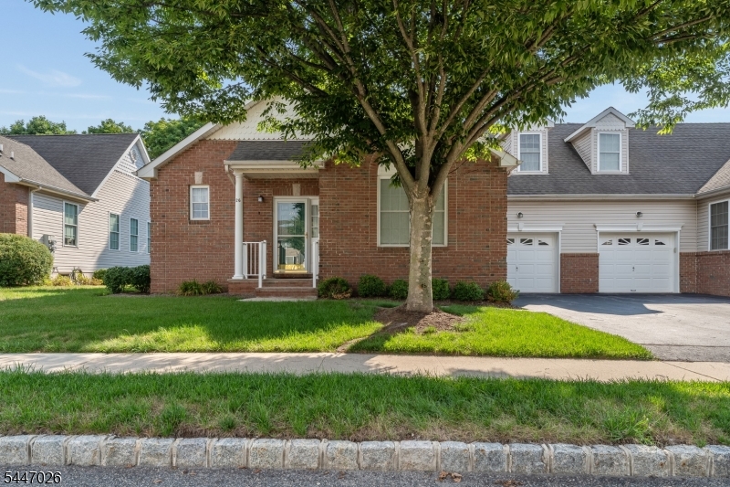 Beautiful Duplex in Flemington Fields features foyer entry with an open floor plan and gleaming hardwood floors. Living room has a gas fireplace and opens to  spacious Dining Room with high ceilings, slider leading to deck and patio with a private backyard.  Kitchen features gas range, microwave, dishwasher and refrigerator. Convenient laundry closet is off the kitchen. First floor primary bedroom has a large walk-In-closet, renovated bathroom with shower. Powder room, direct entry to attached garage complete the first floor. The upper level provides a versatile loft space ideal for a home office or den along with a well-appointed second bedroom and a full guest bathroom. Additional storage is never an issue with the inclusion of a full, clean, and unfinished basement. Ideally situated in the heart of Flemington Fields, this residence is just minutes away from vibrant local shopping, the charming historic Main Street, and major commuting routes, offering the perfect blend of comfort and convenience.