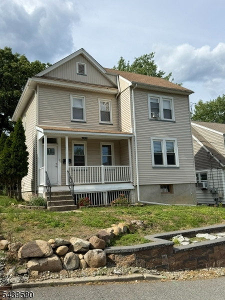Discover this beautifully updated two-family home, each floor offering a cozy one-bedroom layout. Both units have been thoughtfully renovated with modern finishes. Basement offers access to the utilities along with Laundry Access for both units Great investment property!