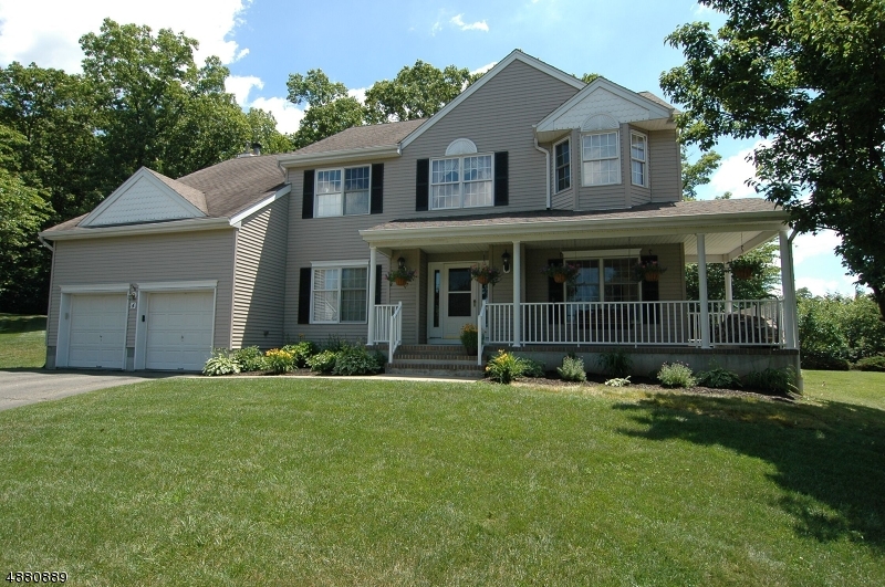 PRESENTING...YOUR DREAM HOME. SITUATED ON A SMALL CUL DE SAC AND BACKS TO GREEN ACRES THIS GORGEOUS UPDATED COLONIAL AWAITS ITS NEW OWNERS WHO WILL ABSOLUTELY LOVE THIS FRESHLY PAINTED & UPDATED HOME. ENTER FROM THE CHARMING COVERED FRONT PORCH WITH SWING & THEN YOU WILL BE WOWED BY THE GRAND 2 STORY FOYER ENTRANCE LEADING TO KITCHEN WITH QUARTZ KITCHEN COUNTERTOPS & STAINLESS STEEL APPLIANCES & SLIDERS THAT LEAD TO LARGE ENTERTAINING DECK WITH HOT TUB & PATIO. THE 2 STORY FAMILY RM IS ADJACENT TO THE KITCHEN & FEATURES A BEAUTIFUL WOOD BURNING FIREPLACE OTHER FEATURES INCLUDE FINISHED BASEMENT, CUST MOLDING, 75 GAL WATER HEATER, GENERATOR HOOK UP FOR WHOLE HOUSE & GENERATOR ALSO INCLUDED, ENJOY THE PRIVATE YARD W TRAIL ACCESS NESTLED ...ALL WINDOW TREATMENTS & APPLIANCES INCLUDED. HOME WARRANTY INCLUDED!