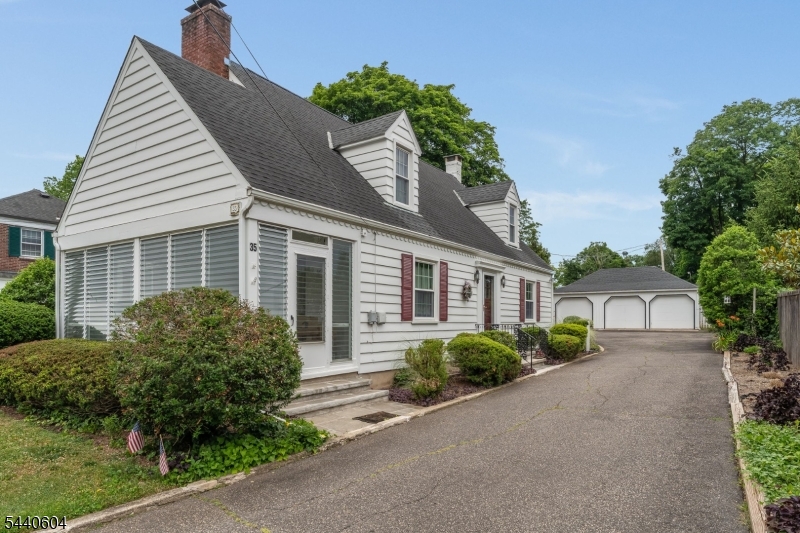 Classic Cape Cod charm in the heart of Flemington! This well-maintained three bedroom, two bath home offers timeless appeal with a spacious living room and dining room combination featuring a cozy wood-burning fireplace and attractive built-in bookcases. The eat-in kitchen features a large pantry and dutch door leading to a private flagstone patio, perfect for outdoor dining and relaxation. A porch with jalousie windows provides a bright retreat to enjoy throughout the seasons. The flexible floor plan includes a first floor bedroom or could be used as a separate dining room and a full bath. The second level offers two additional bedrooms with built-ins, extra storage, two hall linen closets and a full bath. The partially finished basement w a non-functional fireplace, paneled walls and built in bookcases, provides additional living or recreation space to suit your needs. Established perennial plantings add beauty and seasonal color to the landscaped grounds. Adding to the property's unique character is a historic well house along with a 3 bay detached garage with openers and a long driveway offering abundant parking. Ideally located near Flemington's shops and restaurants, this classic home combines historic charm, functionality and an exceptional in-town setting. This property being sold as is, inspections will be for informational purposes only. Priced to sell and is move in ready!