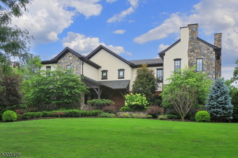 *COMP PURPOSES ONLY* Builder designed & owned this exceptional, 6 bedroom, 6.1 bath Custom Colonial offers stunning features incl mahogany trim & doors, high ceilings throughout & open porches & balcony. Dramatic entry foyer features semi-circular staircase. LR features built-ins & FDR w/fp & box ceiling. Gourmet center island kitchen opens to FR w/2-sided fireplace. Exquisite sunroom with 12ft ceilings & 1st floor BR & bath.Smart home/ whole house spray foam insulation/ Radiant heat flooring on 1st & 2nd Flr. Mstr suite boasts a fireplace/WIC/dressing room and luxurious bath. Four additional bedrooms, each w/private bath. An impressive lower level homes to a pool area/entertainment area, kitchenette, bedroom/gym, playroom & full bath. resort-like property w/ in-ground heated pool/patio/fplc &bar.