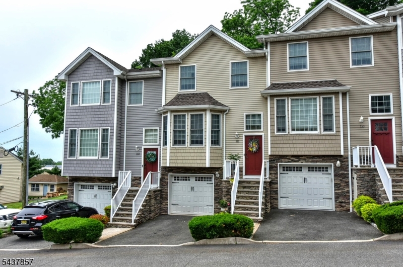 Rarely available in Hasbrouck Heights, this impeccably finished townhome offers two en-suite primary bedrooms and a private walk-out patio, the kind of layout and livability that rarely comes to market at this price point. This luxury townhome, complete with a low HOA, delivers exceptional value with thoughtfully designed spaces that feel elevated at every turn. Hardwood floors throughout, stainless steel appliances, granite countertops, and convenient second-floor laundry are just a few of the standout features that make this home truly move-in ready. The attached garage with an adjacent family room/den offers the flexible living space today?s buyers are looking for ? perfect for a home office, gym, media room, or guest area. Built in 2017, the home also includes remaining new construction warranty coverage for added peace of mind. Ideally located near shopping, dining, parks, and major transportation routes, residents will appreciate the ease of commuting into New York City. This is a rare opportunity to own a stylish, low-maintenance home in one of Bergen County?s most desirable communities. Don't miss your chance to see this gem, schedule your private showing today!