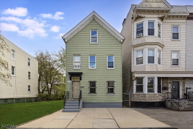 Unlock the potential of this versatile 3-bedroom, 2-bath property in Newark! This multi-level home offers a unique layout ideal for investors or buyers looking to customize their dream space. The first floor features a cozy one-bedroom unit complete with a kitchen, living room, and full bath perfect for extended living or rental income. Upstairs, the second unit offers two spacious bedrooms, a full bathroom, and access to a finished attic with additional bedrooms, providing plenty of room to grow. The home also includes an unfinished basement, offering ample storage or the opportunity to create additional living space. Being sold as-is, this property is a fantastic opportunity for those with vision. With some TLC, this home can truly shine don't miss your chance to transform it into something special!