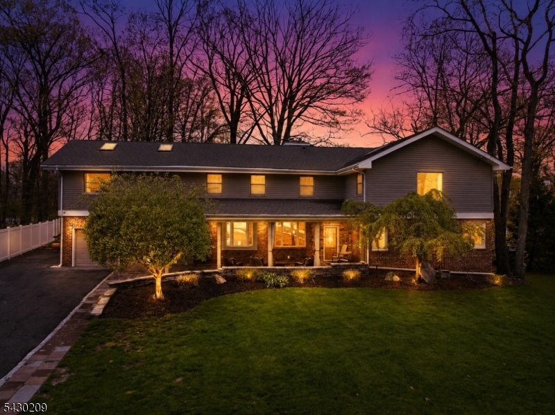 Experience this MASSIVE Colonial / Expanded Ranch residence situated in highly-sought after White Meadow Lake community within walking distance to your very own private Beach and just 1 hour to NYC! This Entertainers Dream Home features a custom front Patio / covered front Porch making an impressive first impression. Upon entry you are greeted by an awe inspiring brick-faced Foyer / Breezeway with access to the Main Level, Backyard & Garage. The Main Level is highlighted by an Open-Concept Floor Plan with Chef's Kitchen offering a heated Center Island Breakfast Bar, gorgeous Granite Countertops, High-End Stainless Steel Appliances & custom Cabinetry, 2 FIRST FLOOR spacious Bedrooms, beautiful Brazilian Cherry Hardwood Floors & a Full Bathroom. Ascend upstairs where you will find a HUGE Primary Suite featuring soaring Cathedral Ceilings, Skylights, an En-Suite Bathroom & Walk-In Closet, a BONUS Recreation Room which can be used as a Bedroom, 2nd Living Room, an Office, Gym or Library Room. The Finished Basement presents a custom Bar and 2 large storage rooms. The Backyard Oasis includes a custom Stoned-Faced Wood Burning Fireplace, paver Patio & Gazebo incredible for hosting & relaxation. Come make this home yours before someone else does!