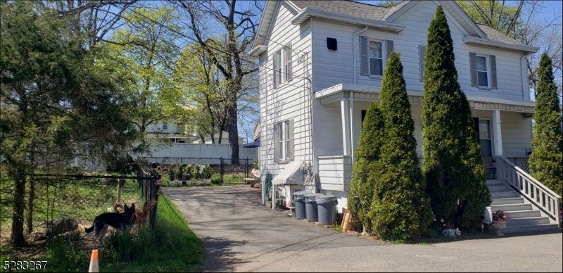 Great investment opportunity to own this two family house.  Both units rented. Second floor has open porch, foyer, washer, dryer, one large bedroom & living room with gorgeous hardwood floors & eat in kitchen. First floor has two large sized bedrooms, living room, kitchen & full finished basement, additional bedroom on the basement level, plenty of kitchen cabinets, utility room & storage. Massive fenced in yard for those fur babies, possible subdivision.  Must check with town regarding variance.
