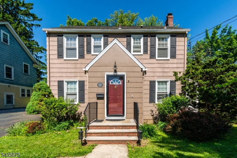 Welcome to the desirable Piedmont section of Bound Brook, where timeless charm meets everyday comfort. This classic 1930s Colonial offers 3 bedrooms, 1 full bath, and the character that buyers look for in town.  Inside you'll immediately appreciate the original details, beautiful hardwood floors throughout both the first and second levels, and the warm, inviting feel that only a well-built home can provide. The traditional floor plan offers comfortable living spaces filled with natural light and classic architectural touches.  The side 3-season porch leads to a private fenced backyard perfect for entertaining, gardening, or simply relaxing. Enjoy summer gatherings on the large deck overlooking the yard, while the detached garage provides additional storage and convenience.This home offers the perfect blend of character, privacy, and location. If you've been searching for a home with history, charm, and room to make lasting memories, this one you won't want to miss.