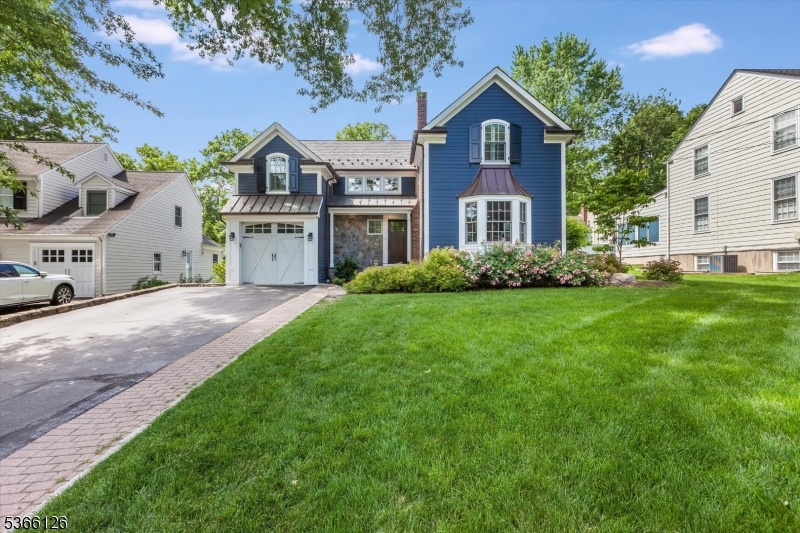 Location, Location, Location, welcome to this thoughtfully updated Colonial perfectly nestled on a quiet, tree lined street that offers both charm and convenience. Enter the home into the foyer w a large LR, formal DR, family room, eat in kitchen w high end appliances, mud/laundry room, garage entrance, this completes the 1st floor. Upstairs with a primary suite two walk in closets, large shower, double vanity +3 additional bedrooms and a hall bath finish the second floor. The lower level offers a fifth bedroom, full bath and a large recreation/playroom for additional space. Sliders off the family room take you out to a bluestone patio, a built in fireplace and grill for all of your entertaining needs. A whole house generator is also included with this Chatham gem. You won't be disappointed.
