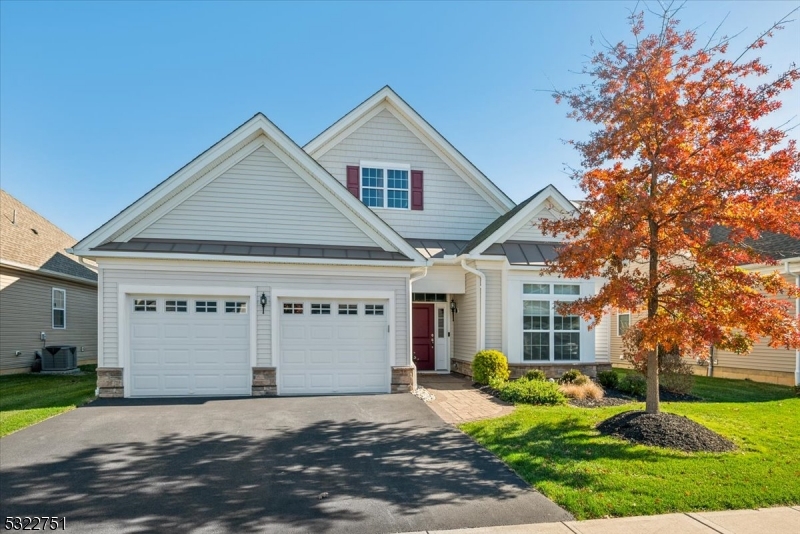 Experience elevated living in this gorgeous, upgraded Ranch home within the highly desirable "Regency at Flanders" by Toll Brothers, a vibrant 55+ community with incredible amenities. Nestled in prestigious Morris County, this 2 Bed, 2 Bath home with an additional Office/Den boasts a well-designed open floor plan and exquisite finishes. The gourmet kitchen showcases SS appliances, while the expanded great room, with hardwood floors, 10-ft tray ceilings, and a cozy gas fireplace, creates an inviting atmosphere. The main floor owner's suite adds convenience, and thoughtful upgrades like custom wainscoting, premium flooring, and elevated ceiling choices reflect the home's attention to quality and style. A unique highlight is the spacious walk-up attic, offering endless possibilities. With ample room for storage or potential to be finished as a private retreat, hobby room, or extra living space, this attic is a blank canvas awaiting your vision. Enjoy a seamless transition from indoors to outdoors with a walkout to a nice-sized patio, perfect for relaxing and taking in the surroundings. This community extends your lifestyle with a clubhouse, fitness center, and heated outdoor pool. Connect with neighbors on the tennis, pickleball, bocce, or take peaceful walks on trails around a scenic pond. Ideally located near shopping, restaurants, parks, and the Flanders Valley Golf Course, this home combines luxury, comfort, and community. Move in and make this dream lifestyle yours!
