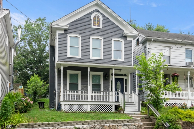 Your transitional-style home has arrived! This charming property offers the perfect blend of historic character and modern updates, located in the desirable historic section of Belvidere, NJ. From the moment you enter, you will appreciate the warmth, charm, and tasteful improvements throughout. The first floor features an open living room and dining room layout with new flooring, creating a bright and inviting space perfect for entertaining or everyday living. The kitchen was renovated approximately 5 years ago and offers a functional layout with modern touches. The half bathroom was also recently renovated. The original staircase adds timeless character and truly brings you back in time. The second floor offers 3 bedrooms, a recently renovated full bathroom, and a convenient stackable washer and dryer setup. One of the best features of this home is the large attic space, offering endless possibilities for storage or future additional living space. Enjoy relaxing on the beautiful front porch or entertaining on the rear patio. The property also features private alleyway access in the back for off-street parking, with the potential to build a detached garage in the future. Conveniently located near farms, major retail stores, restaurants, schools, Phillipsburg, NJ, and Easton, PA. If you are looking for the perfect mix of quiet small-town charm with close access to major conveniences, this is your opportunity!